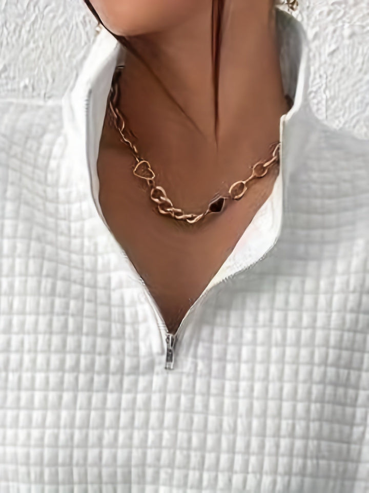 Elodie | Teksturowany Pulower z Kwartowym Zapięciem